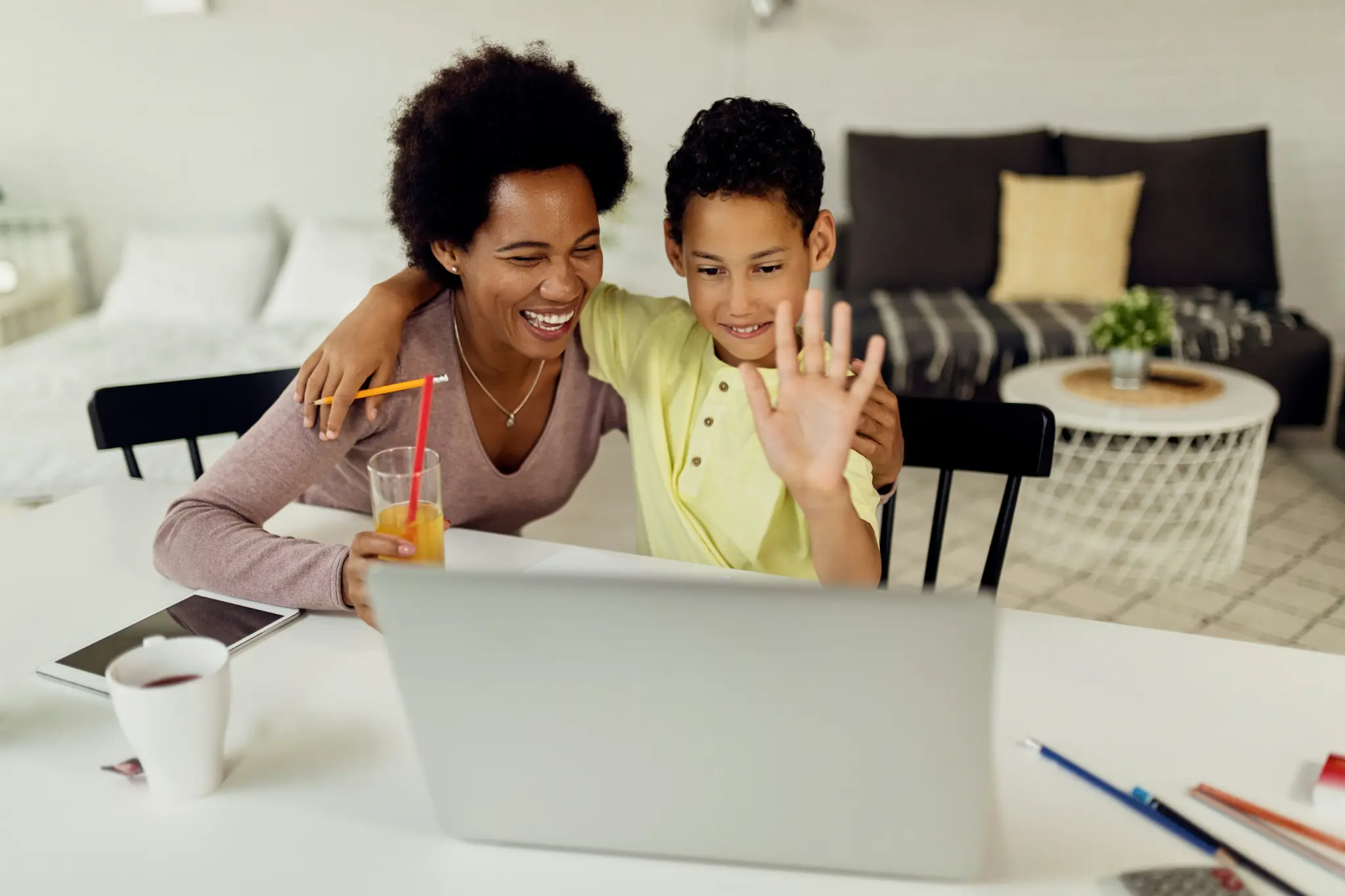 Parent and child sharing a learning activity at home