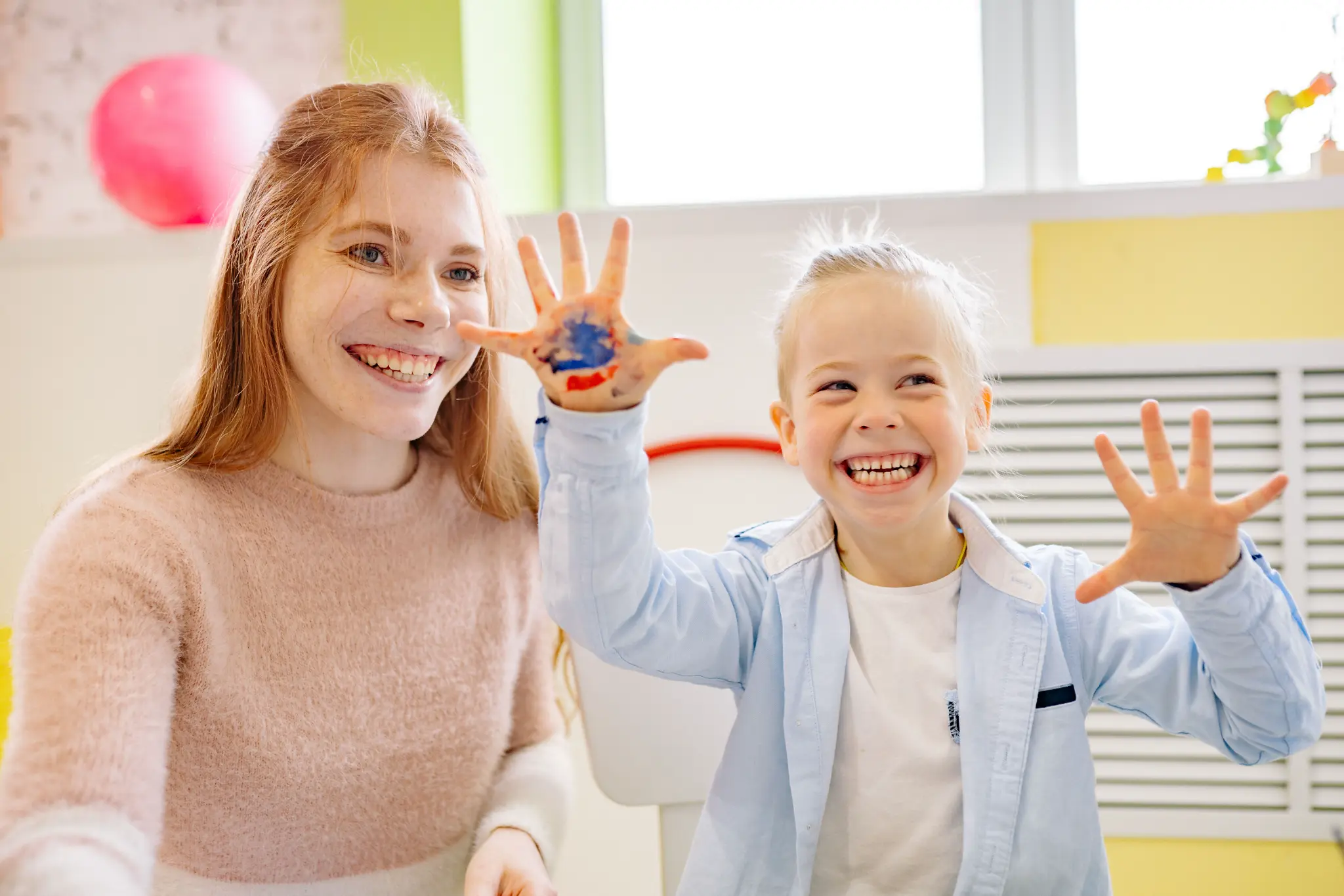 Illustrative lifestyle scene of a child learning through play with a supportive adult at home