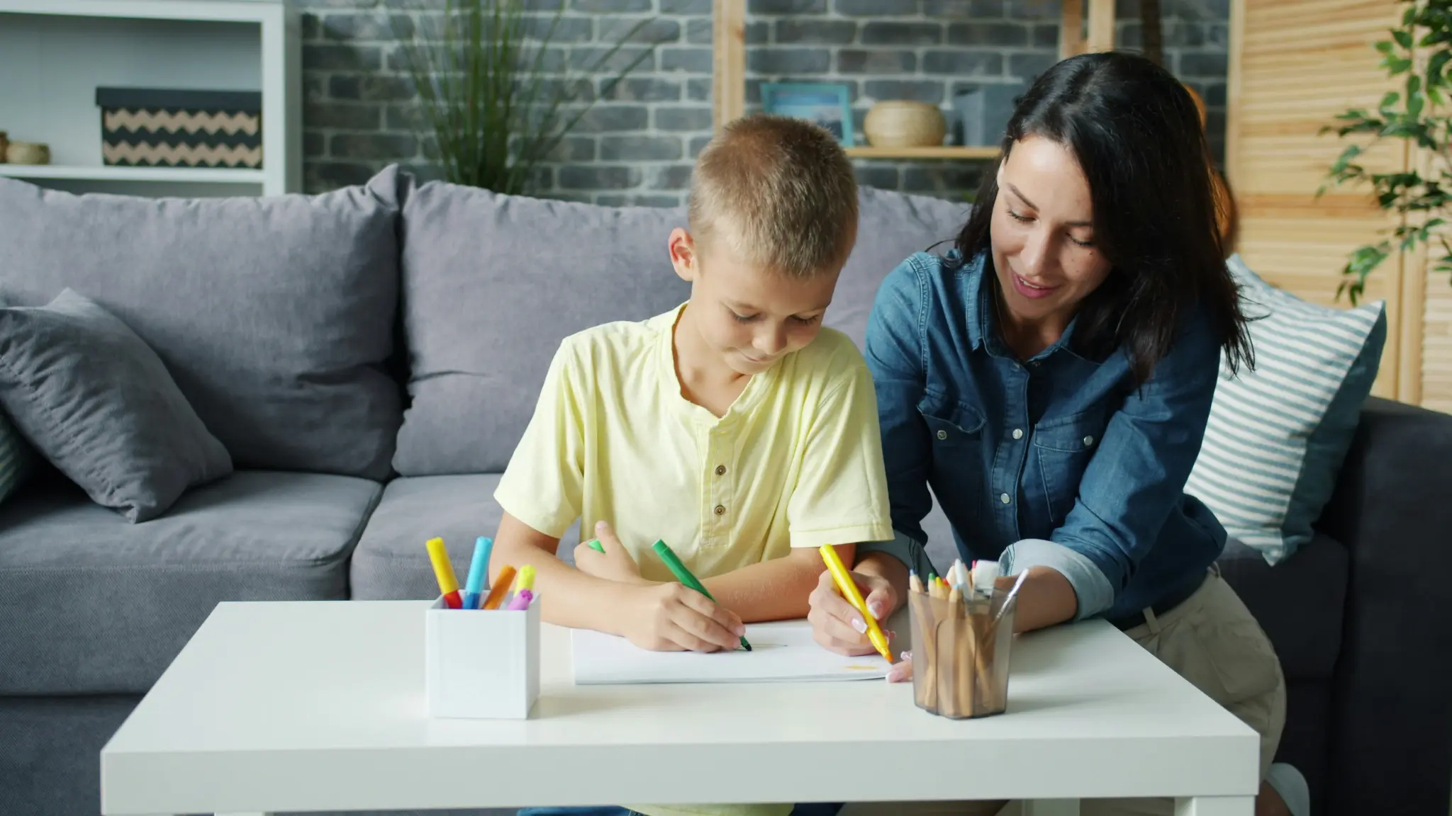 Parent and child working together during a personalized learning activity